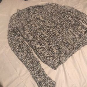 White and black sweater